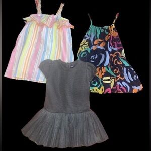 2 Baby Gap sundresses, 1 Tucker and Tate sundress. all 24 mns